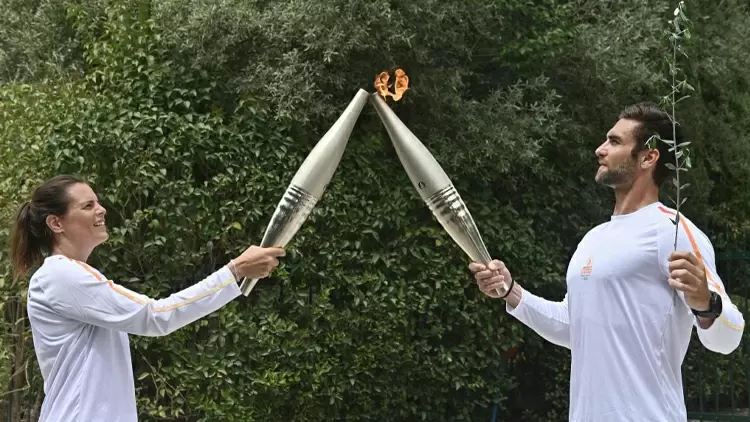 Which ancient civilization did the Olympic torch relay originate from?