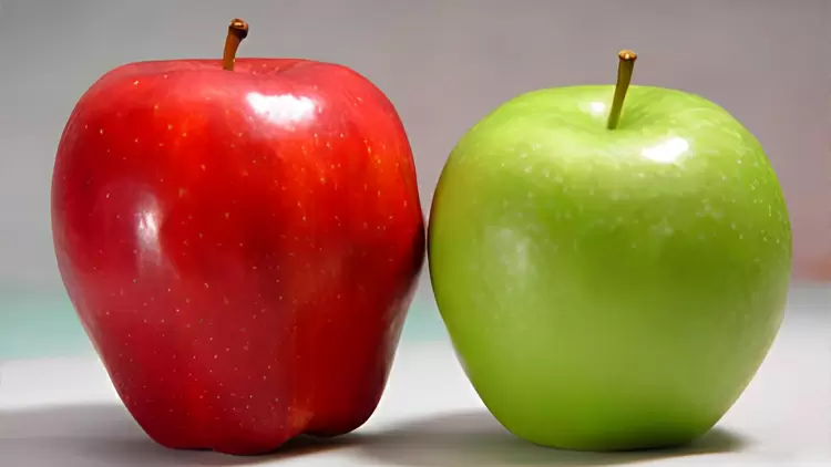 Please select the red apple displayed in the image.